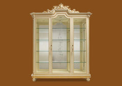 Beautiful wooden carving on top of vitrine