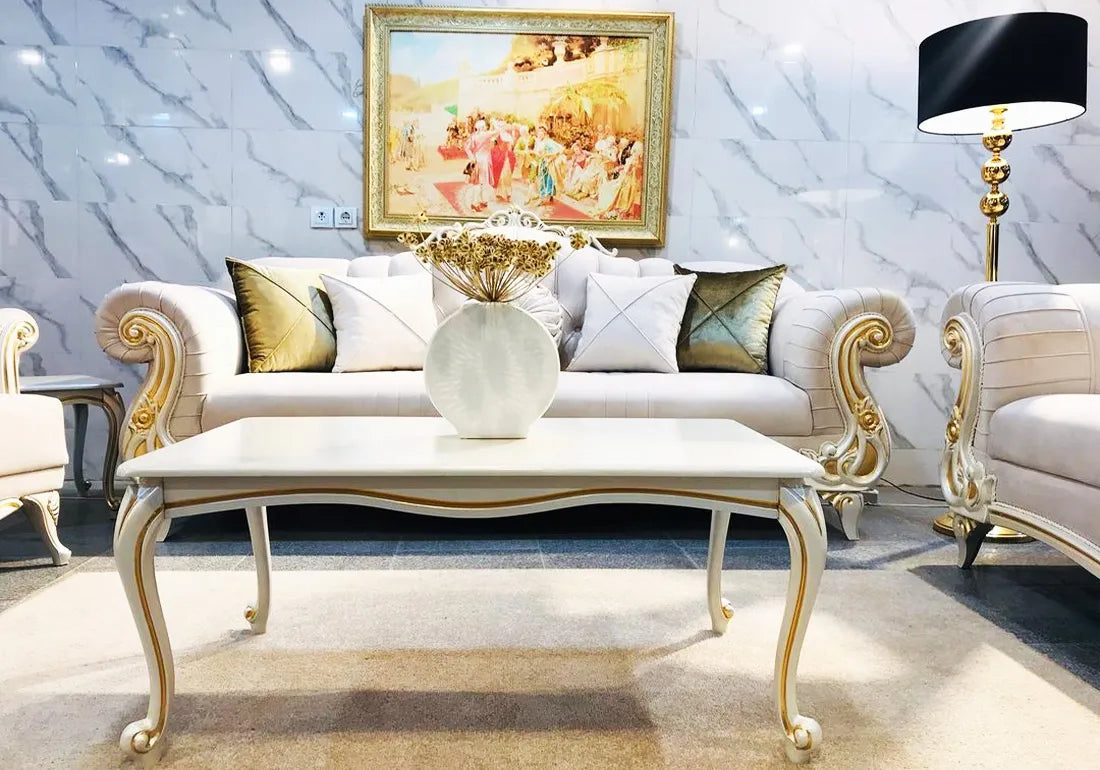 white color 3 seater sofa and center table