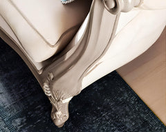 beautiful wooden carving on sofas