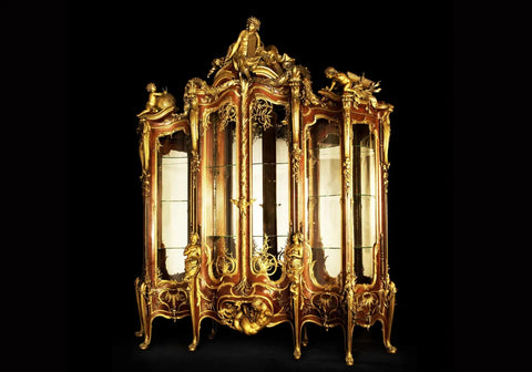 Golden color luxury sculptural vitrine