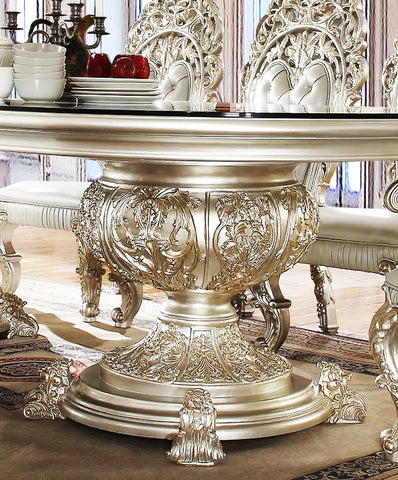 Luxurious Carved Wood Dining Table with Glass